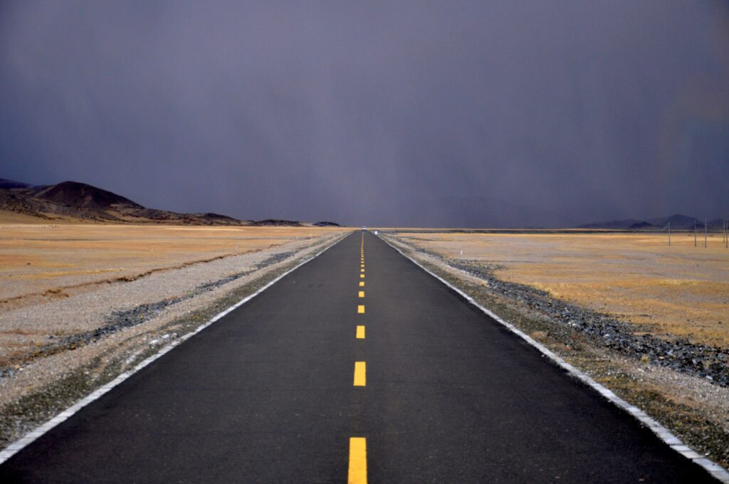 the-road-to-the-clouds-somewhere-in-tibet-just-before-the-storm-photo-was-taken-from-the-bus-window