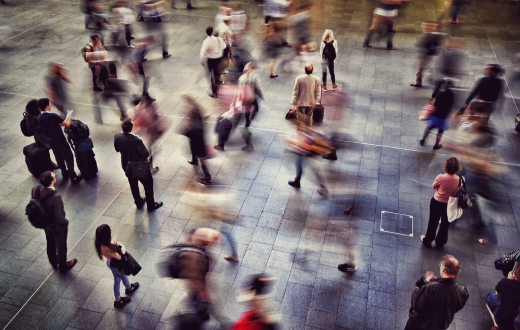 passengers-travellers-business-people-and-commuters-rushing-around-and-waiting-for-trains-in-a-train